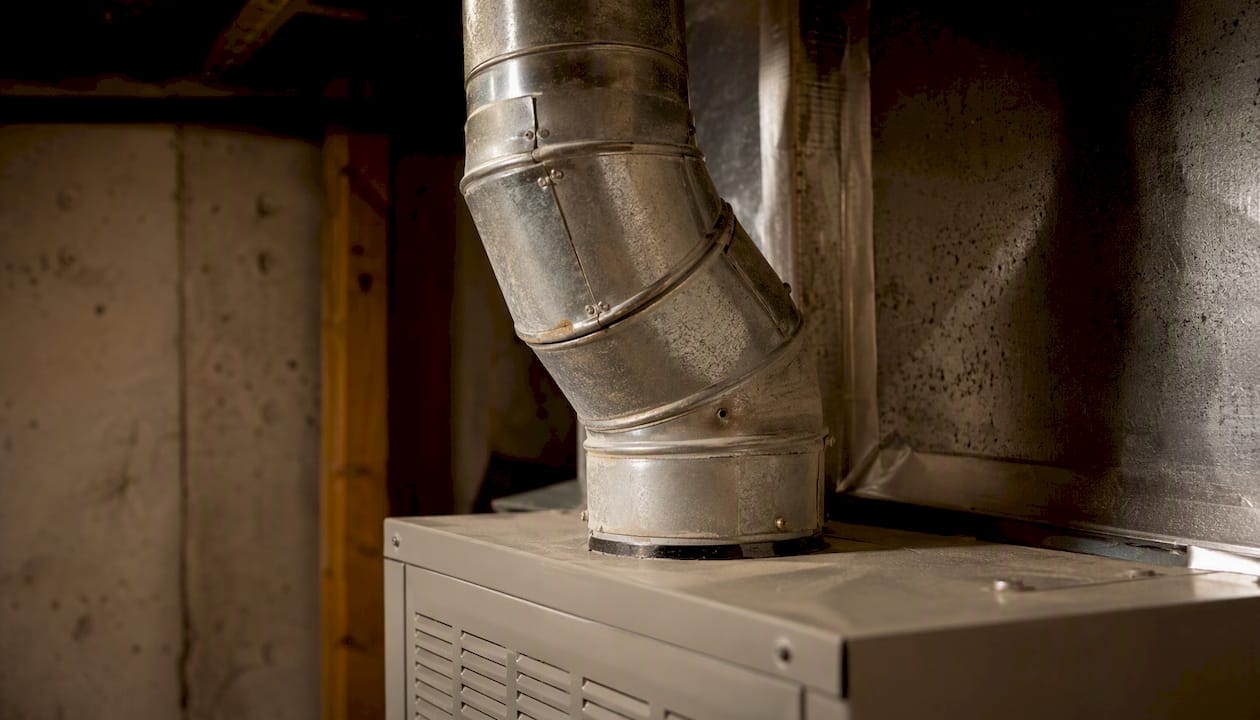 Furnace vent pipe with dust and soot spots