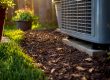 Outdoor AC condenser unit with clearance space