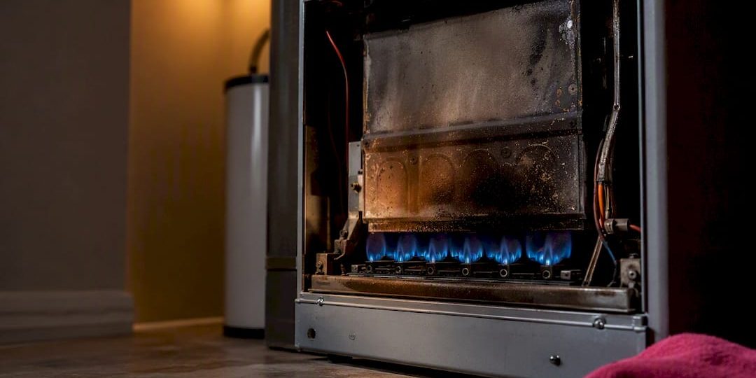 Aging furnace burner showing warning signs