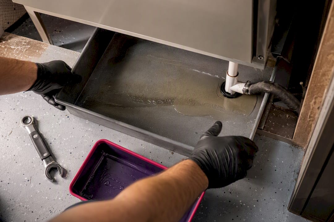 Standing water in an HVAC condensate pan