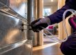 Technician measuring duct static pressure