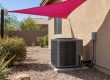 Outdoor AC condenser with open shade clearance
