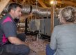 Technician inspecting Arizona HVAC ductwork
