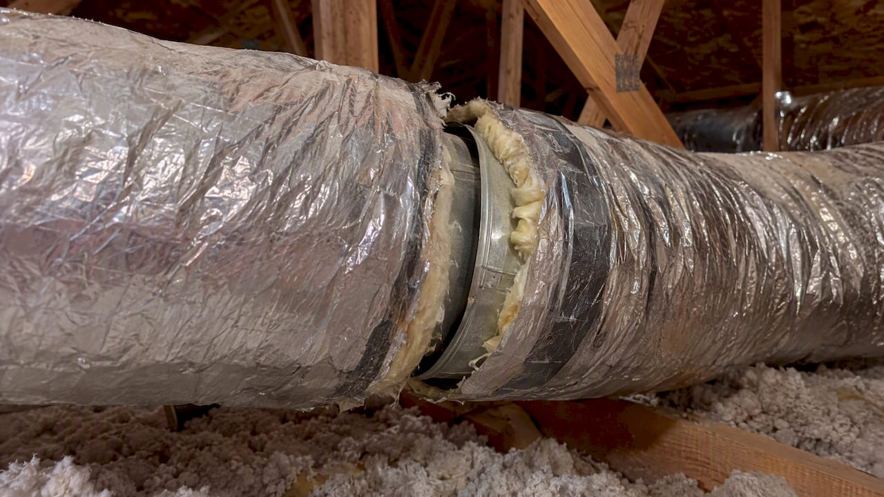 Separated duct seam in an Arizona attic