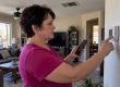 Homeowner timing an air conditioner cycle