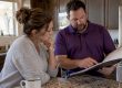 Homeowner reviewing an HVAC maintenance agreement