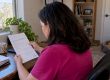 Homeowner reviewing a high electricity bill