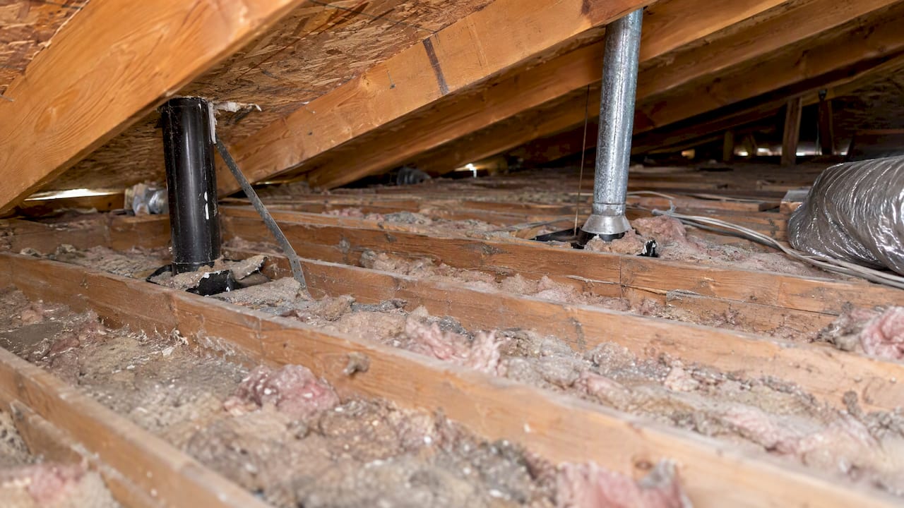 Thin attic insulation and unsealed roof gaps